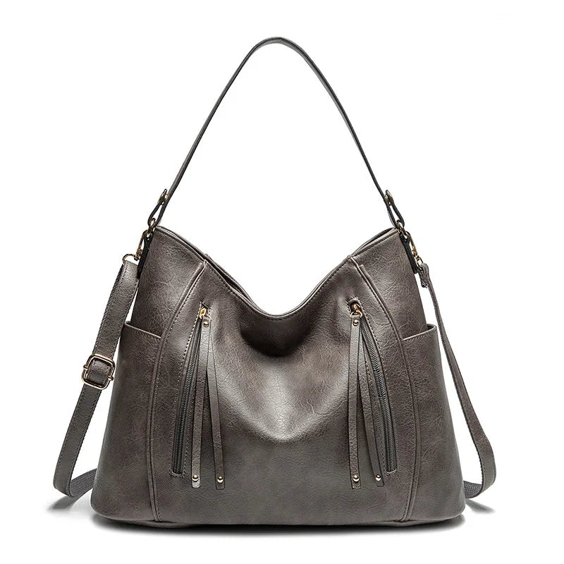 Beibhinn | Fransenledertasche
